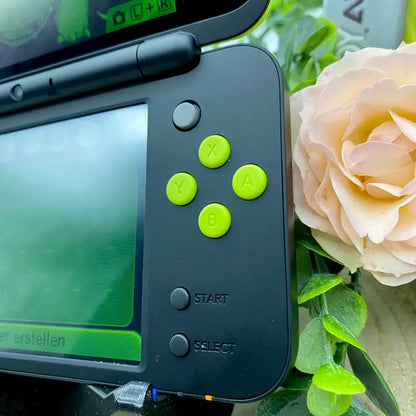 New Nintendo 2DS XL in black/green