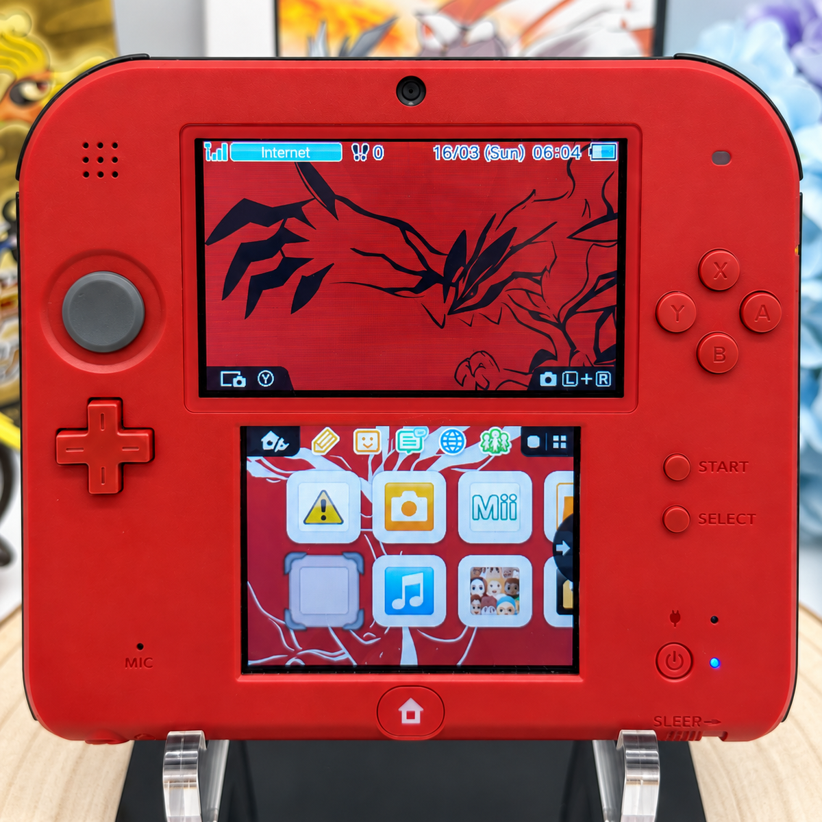 Nintendo 2DS in komplett Rot – Vorderansicht mit beiden Bildschirmen und Bedienelementen